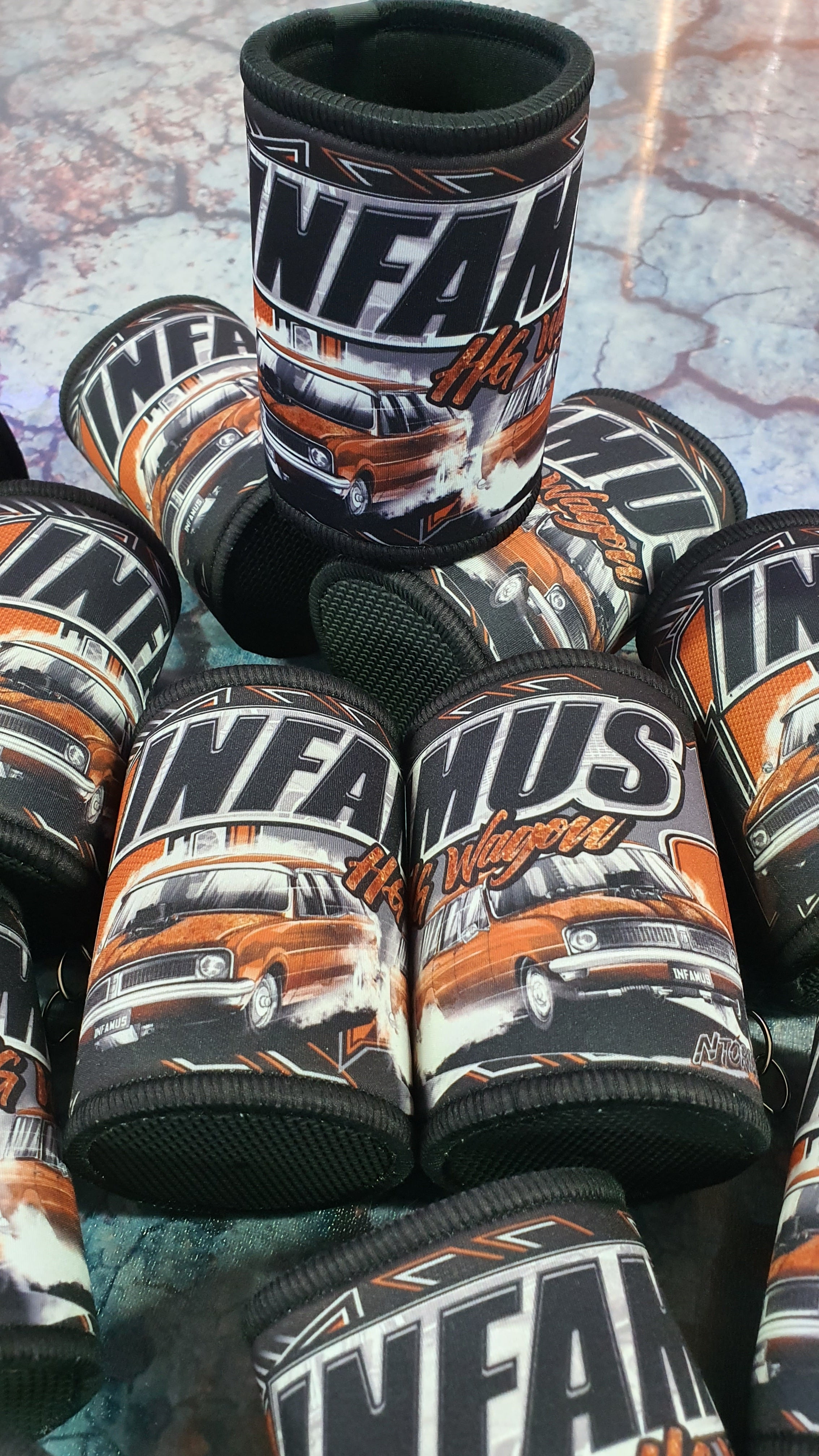 Infamous Racing Infamous Stubby Holder โ Simon O'Carroll Swimming Pools
